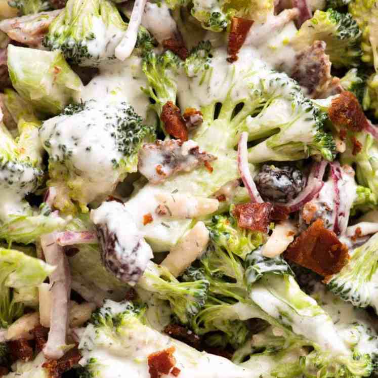 Close up of Broccoli Salad with Lighter Creamy Dressing with bacon, almonds, cranberries and red onion