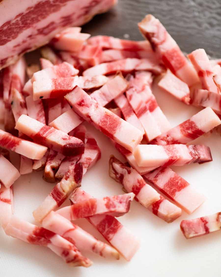 Batons of raw guanciale for Carbonara