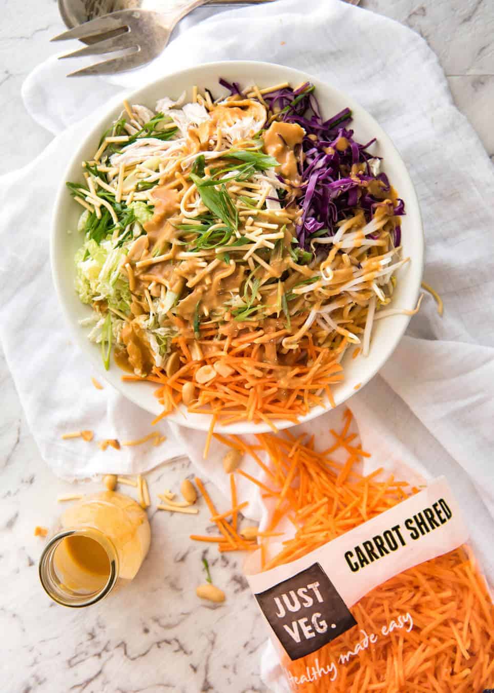 Chinese Chicken Salad with Asian Peanut Salad Dressing - made with cabbage, shredded chicken, crunchy noodles, carrot and a killer peanut dressing! www.recipetineats.com