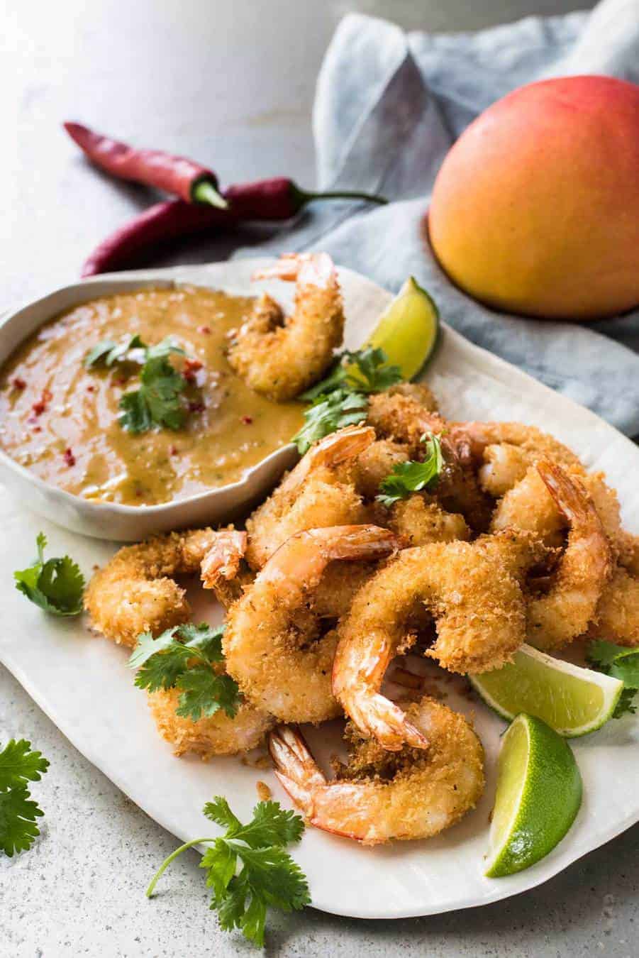 A plate of crunchy Coconut Shrimp / Prawns with Spicy Thai Mango Sauce