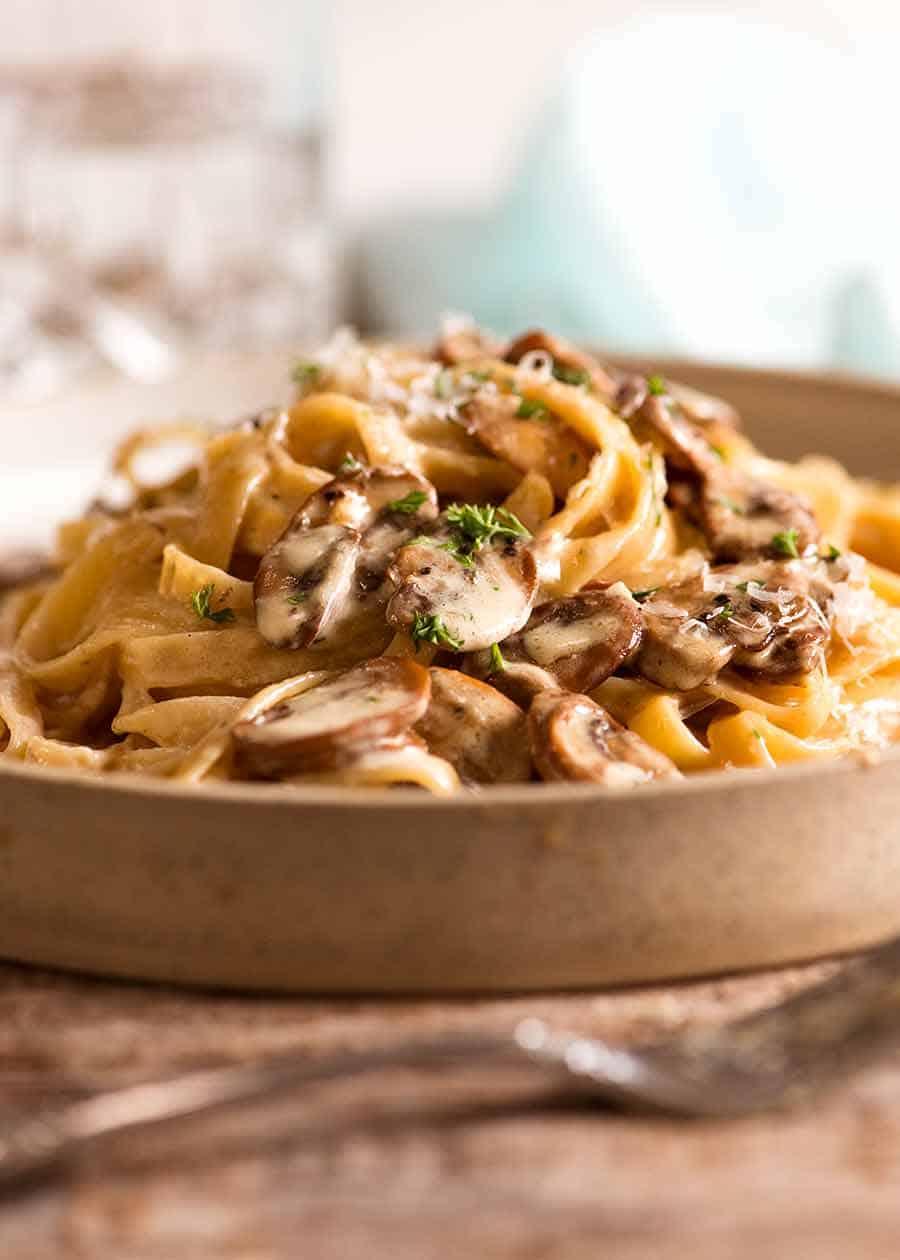 Creamy Mushroom Pasta on a rustic handmade plate, ready to be eaten