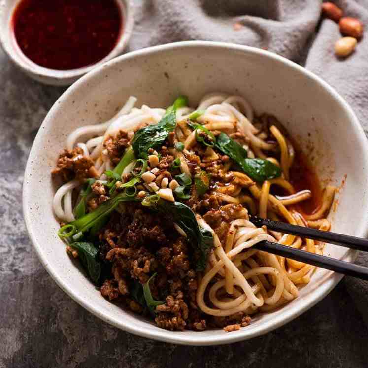 Bowl of spicy Sichuan Dan Dan Noodles, ready to be eaten