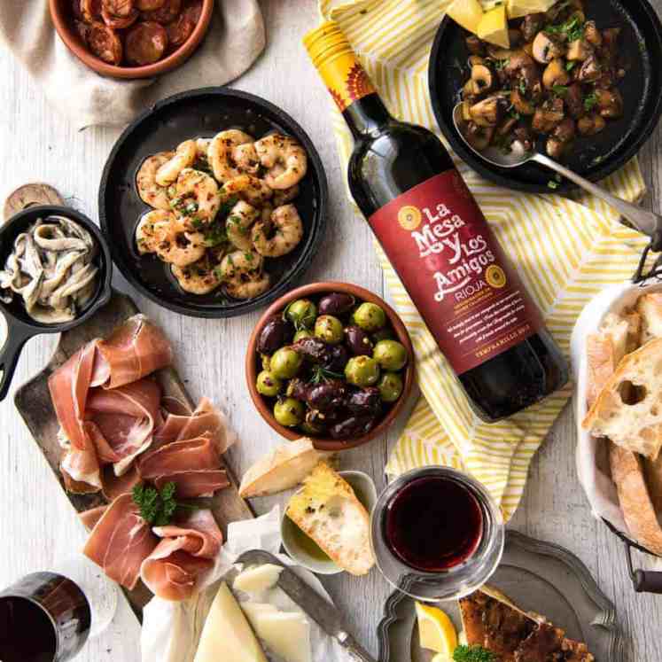 5 Easy Spanish Tapas recipes - all your favorites from the tapas bar! Garlic mushrooms, chorizo, garlic shrimp/prawns, Spanish marinated olives , Spanish omelette and a cheese platter! recipetineats.com