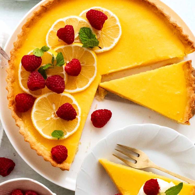 French Lemon Tart - Tarte au citron - being sliced to serve