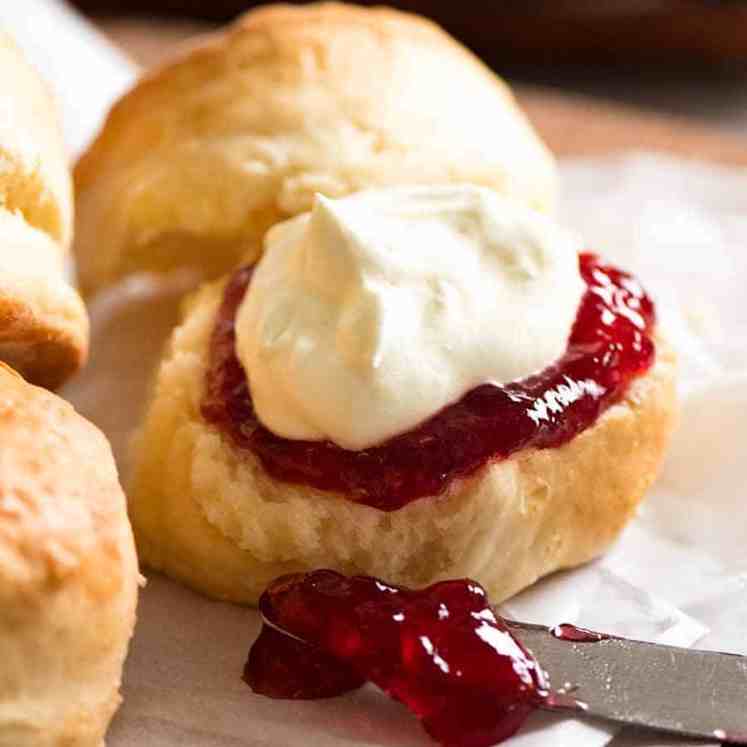 Close up of Lemonade Scones with jam and cream