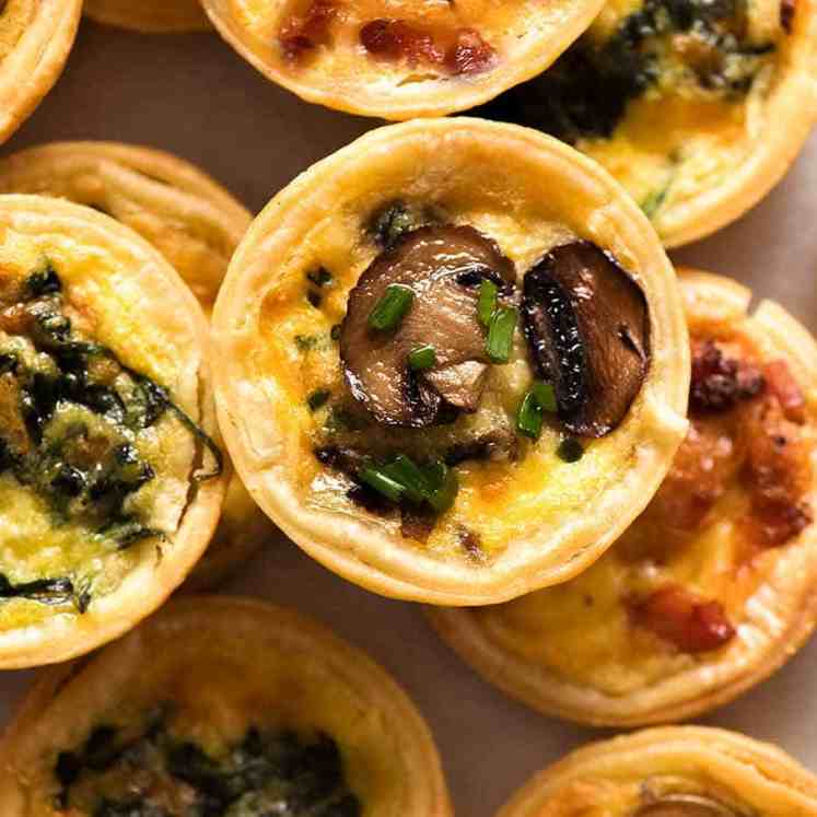 Overhead photo of mini quiches, ready to be eaten