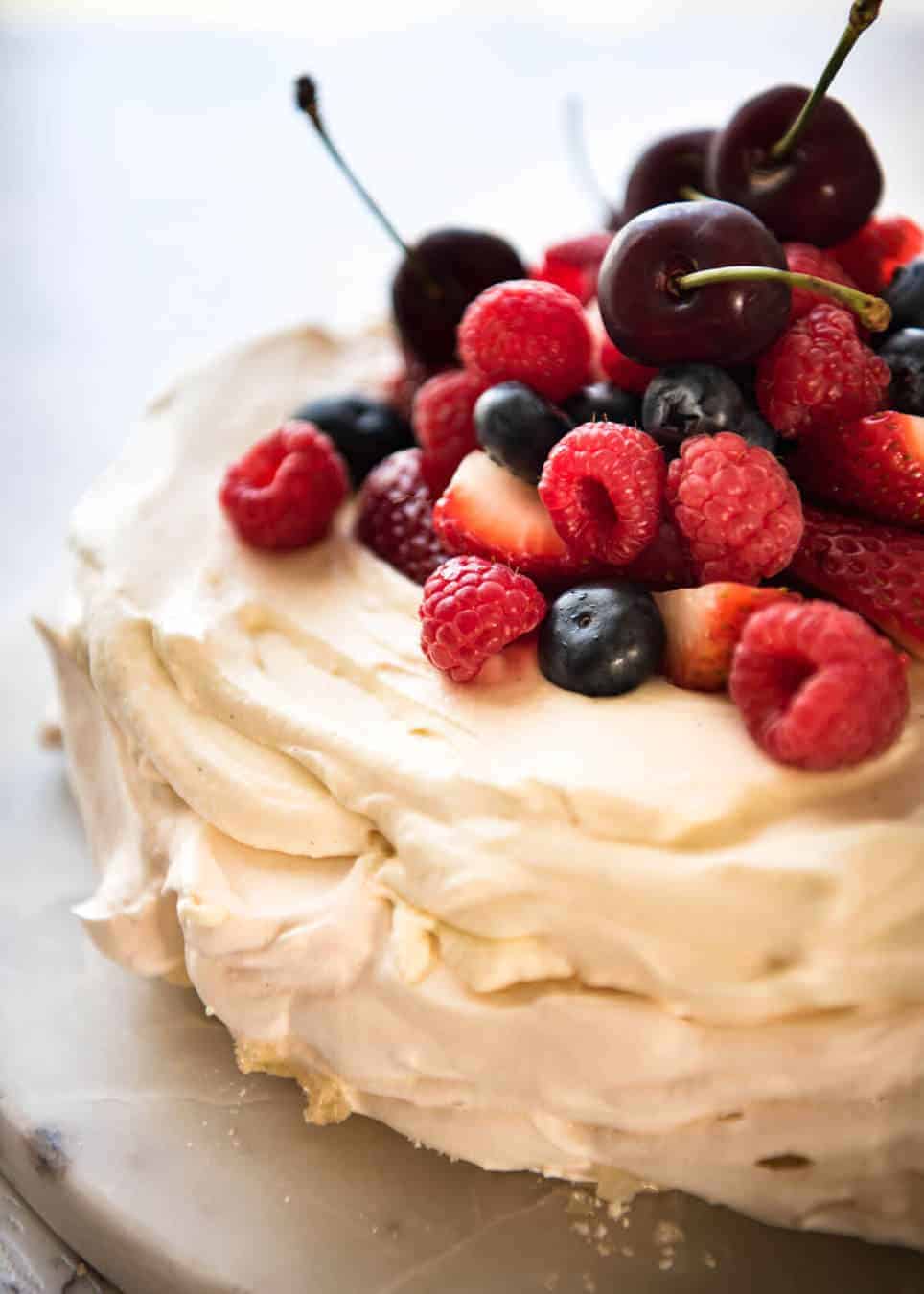 Classic Pavlova recipe with easy to follow tips that make all the difference for a perfect Pav, every time! www.recipetineats.com