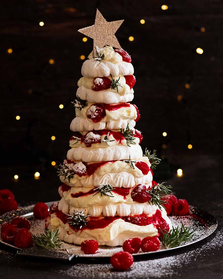 Pavlova Christmas Tree Dessert on a platter, ready to be served