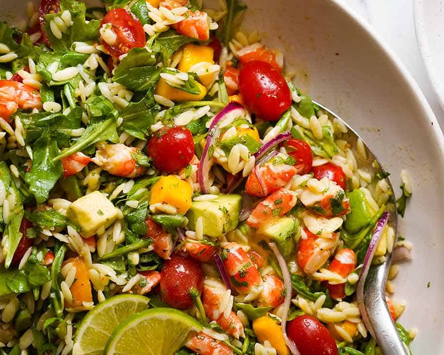 Prawn Mango Avocado Summer Salad with Lime Dressing in a bowl, ready to be served