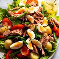 Close up of platter piled high with Salad Nicoise - French Tuna Salad