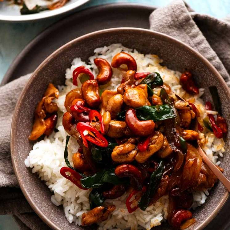 Thai Cashew Chicken Stir Fry on jasmine rice in a bowl, ready to be eaten